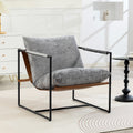 Fauteuil bouclette gris clair, structure acier noir