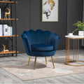 Fauteuil coquillage velours bleu marine, pieds dorés